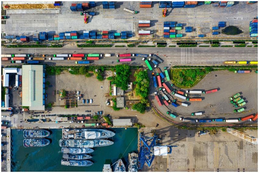 A vibrant aerial view of an industrial port with c