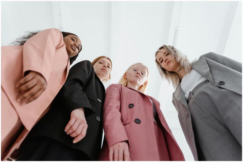 A diverse group of businesswomen in stylish suits,