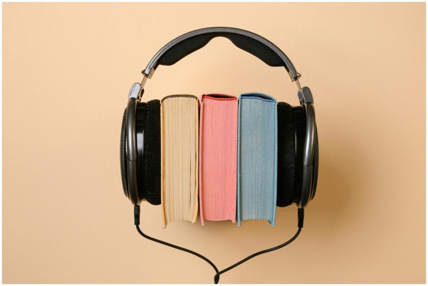 Stylish conceptual image of headphones and books o