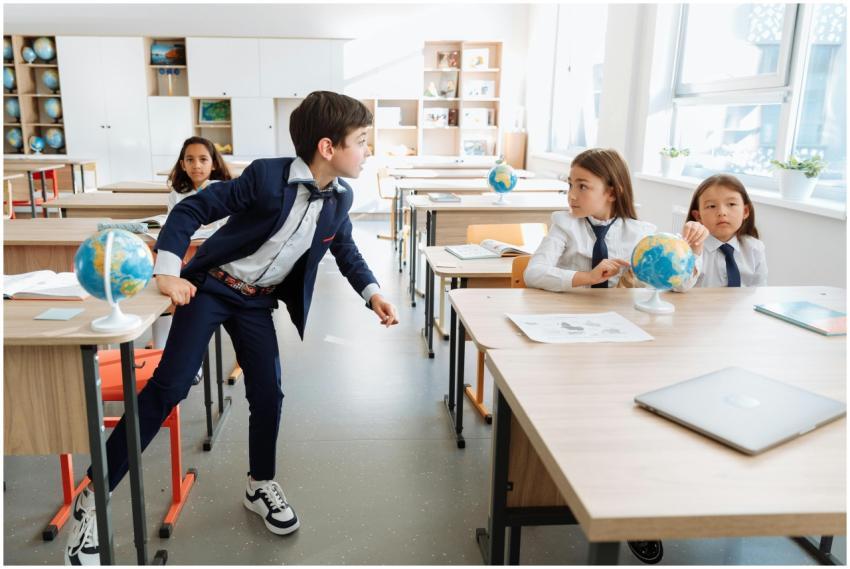 Children in a classroom engaged in studying geogra