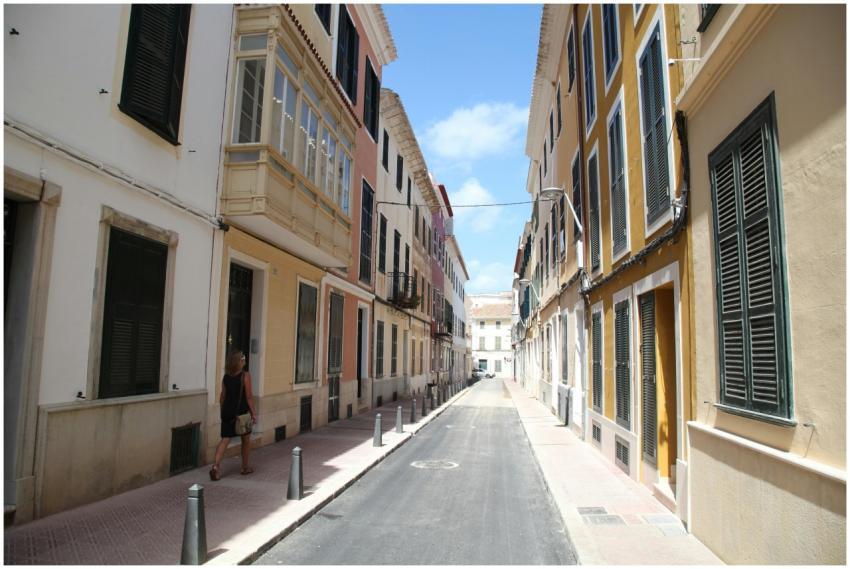 Idyllic street in Ciudadela de Menorca with tradit