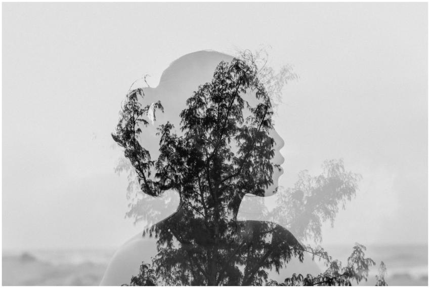 Artistic double exposure capturing a woman's silho