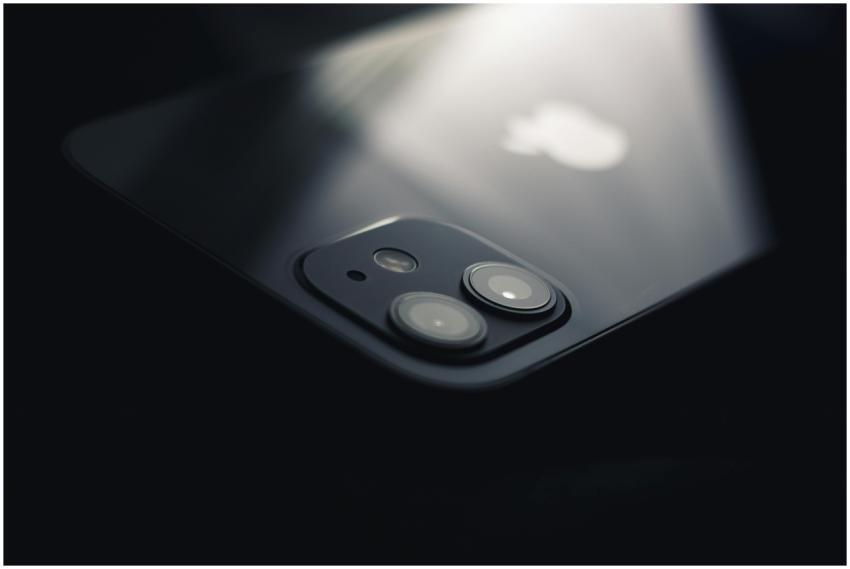 Close-up shot of a smartphone camera lens reflecti