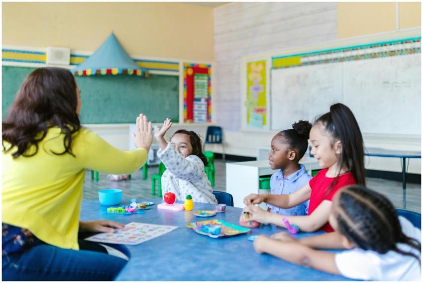 A joyful classroom scene with a teacher and divers