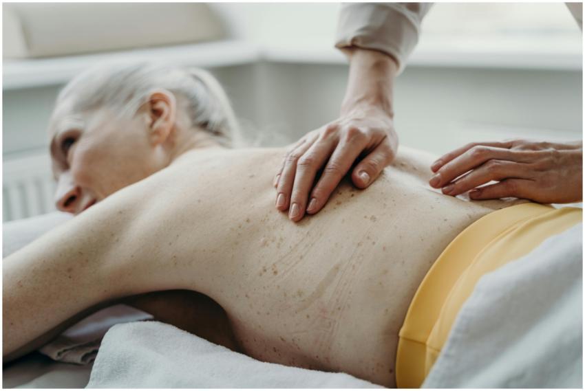 A senior woman enjoying a therapeutic back massage