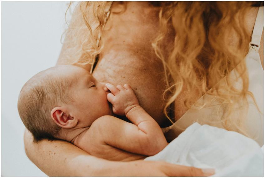 Close-up image of a mother lovingly breastfeeding