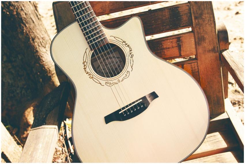 A beautifully crafted vintage acoustic guitar rest