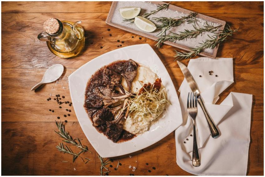 A delicious plate of lamb chops with mashed potato