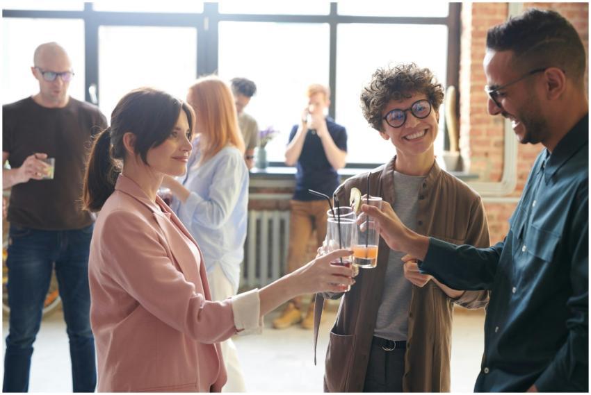 Group of diverse office colleagues enjoying drinks