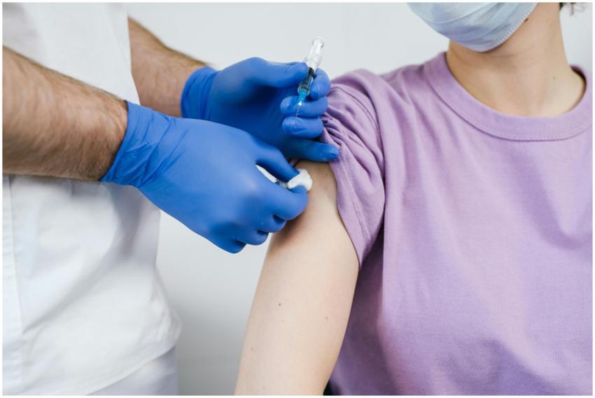 Close-up of a healthcare professional administerin