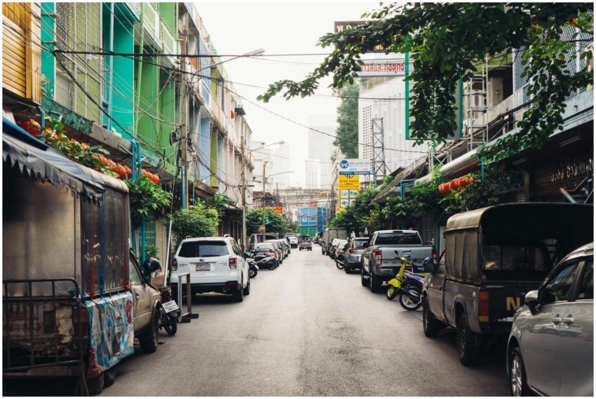 Bustling street in Bangkok with colorful buildings