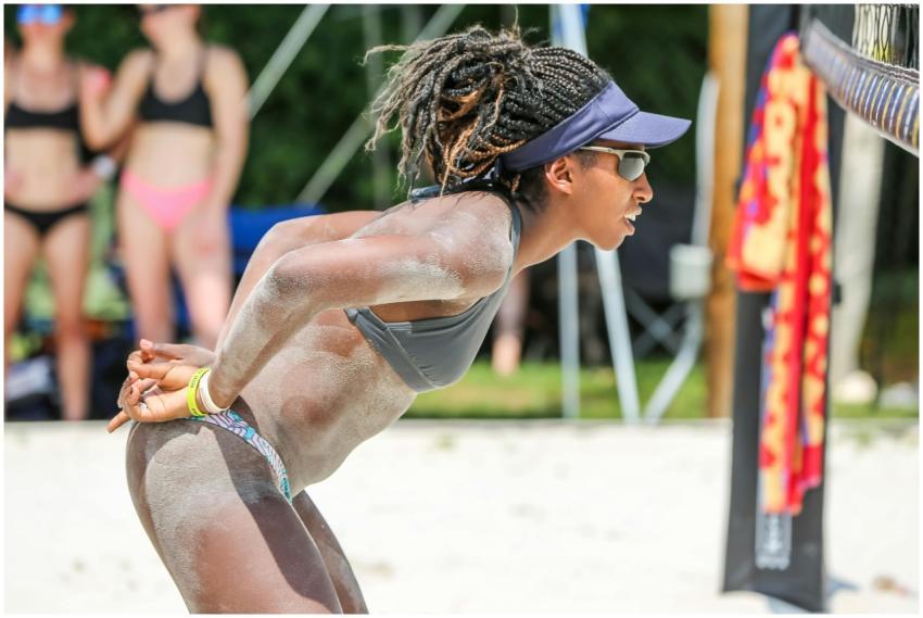 Focused beach volleyball player ready to serve und