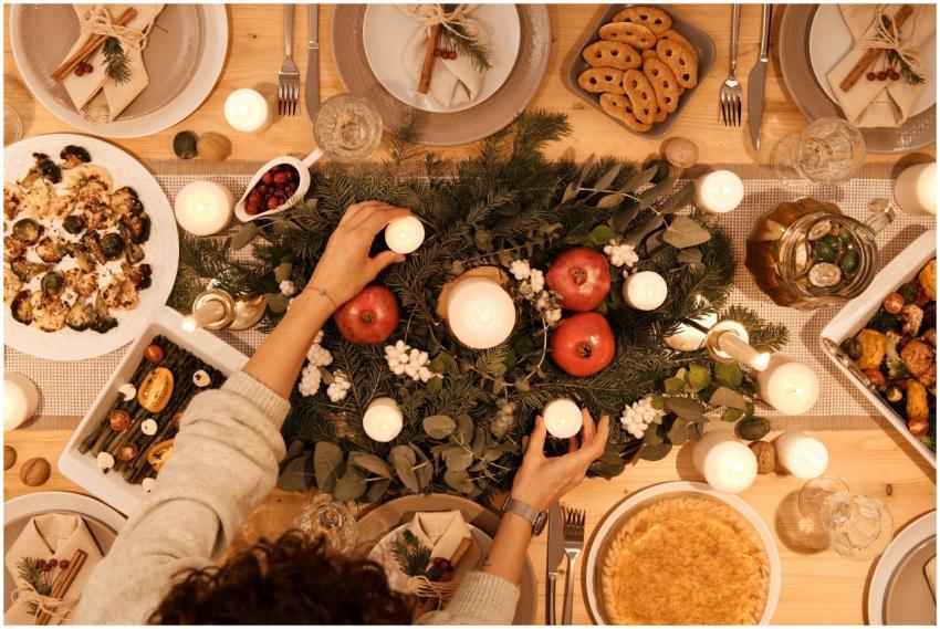 A top-down view of a festive holiday table setting
