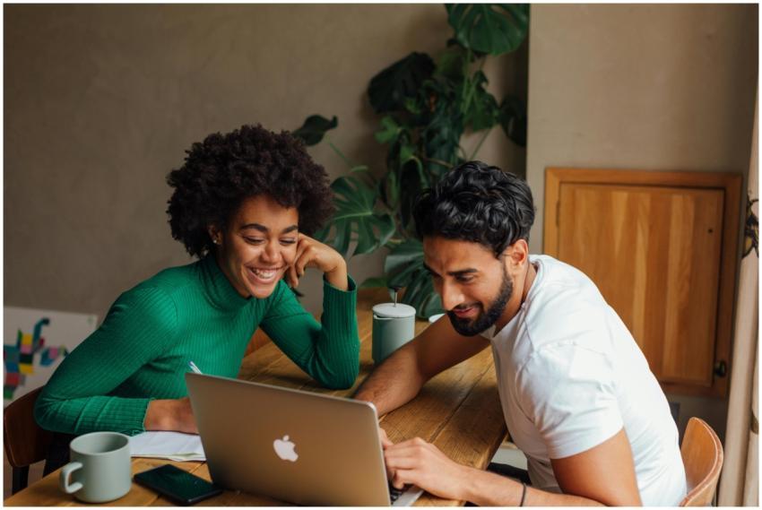 Two colleagues engaged in teamwork, brainstorming