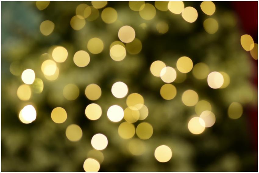 Blurred golden bokeh lights creating a warm, festi