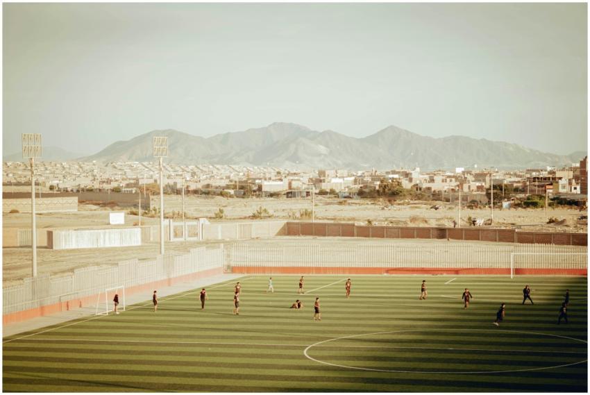 Aerial view of a soccer field with players in Nuev