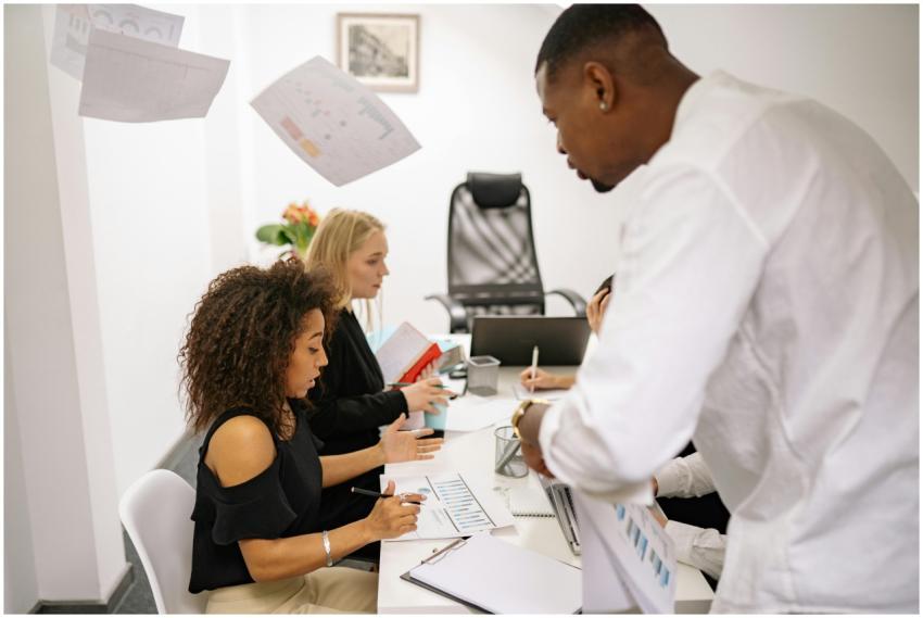 A diverse group of adults engaged in a collaborati