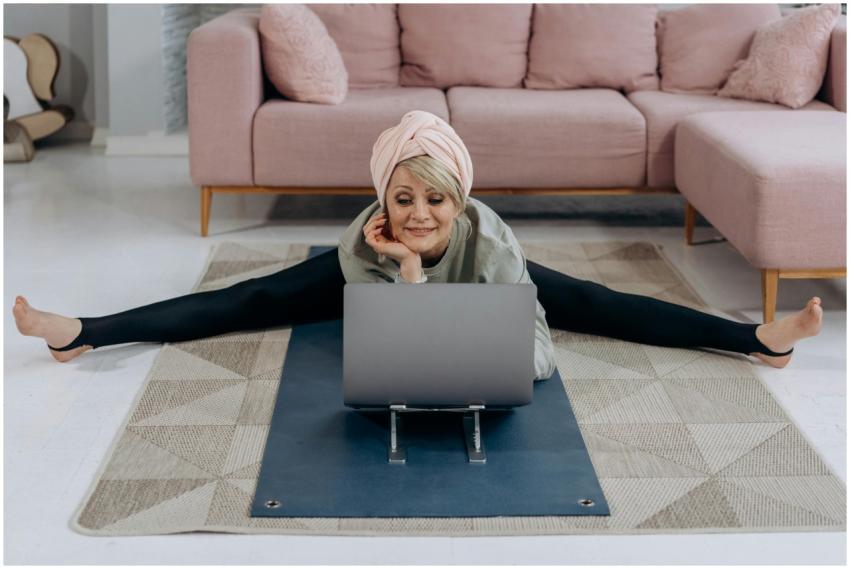 A senior woman enjoys a relaxing yoga session indo