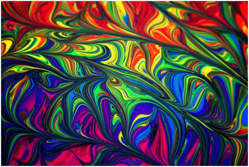 Colorful abstract swirl pattern with vibrant rainb
