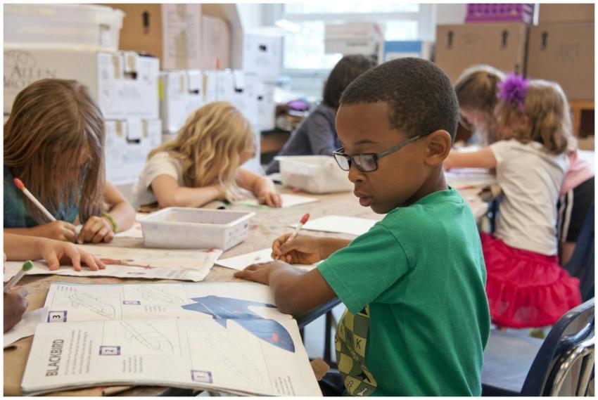 Group of children focused on educational activitie