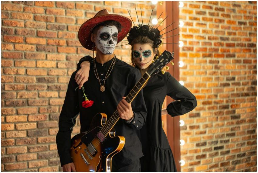 Couple celebrating Day of the Dead with face paint