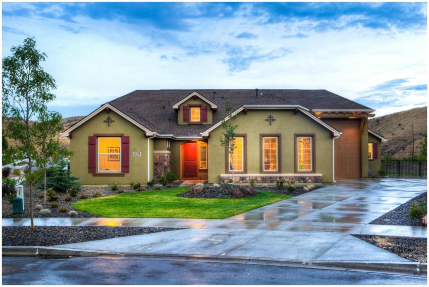 Beautifully illuminated modern home exterior with