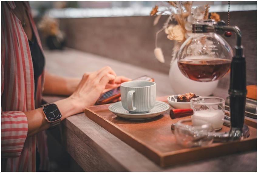 Stylish cafe corner with brewing coffee and desser