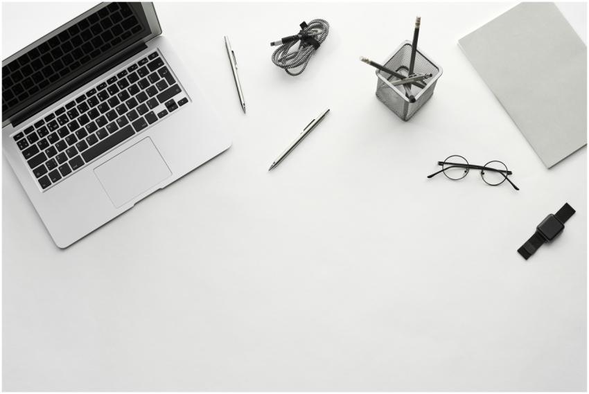 Top view of a minimalist workspace featuring a lap