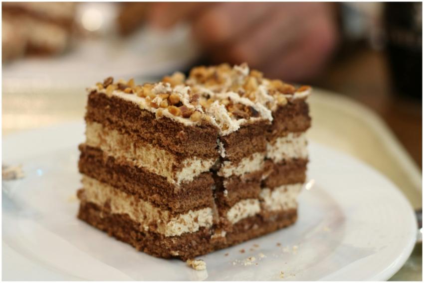 Close-up of a decadent coffee and walnut layered c