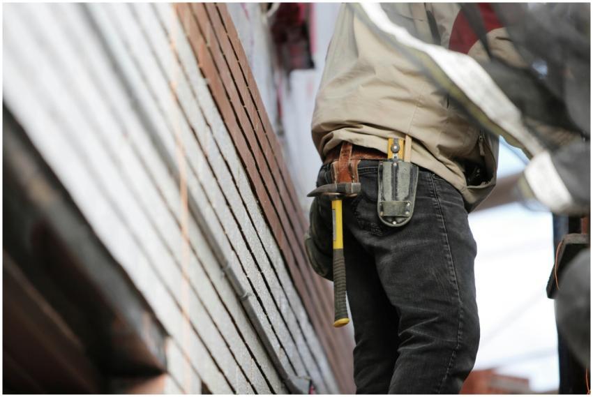 Close-up of a construction worker with hammer and