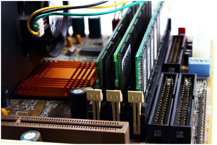 Detailed view of computer motherboard featuring RA