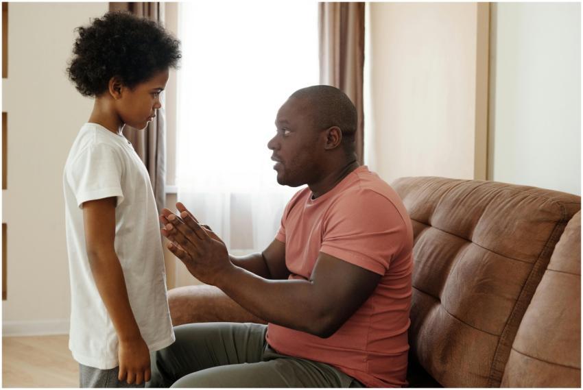 A father and son sharing an intimate conversation