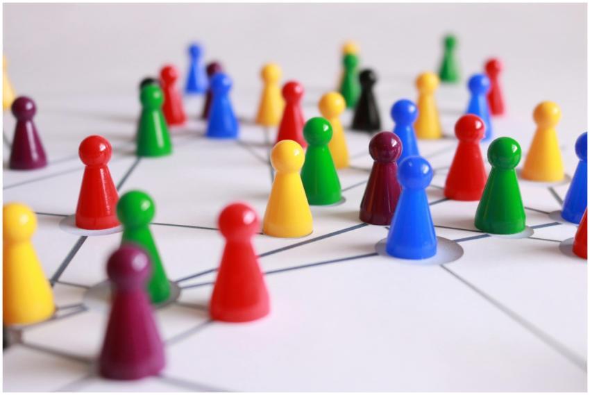 A strategic arrangement of colorful pawns connecte