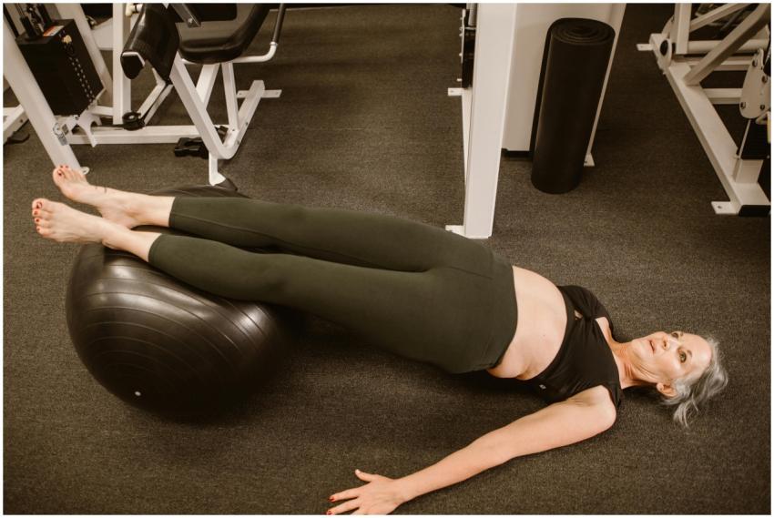 Senior woman performing exercise with a stability