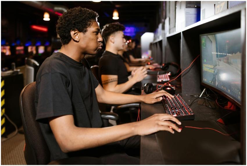 Group of young adults deeply engaged in competitiv