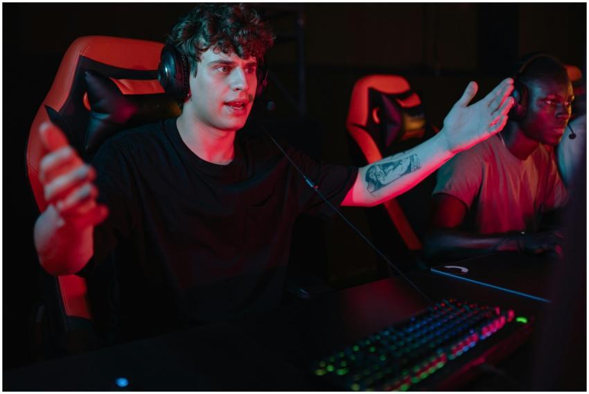 A dynamic image of focused gamers using headsets a