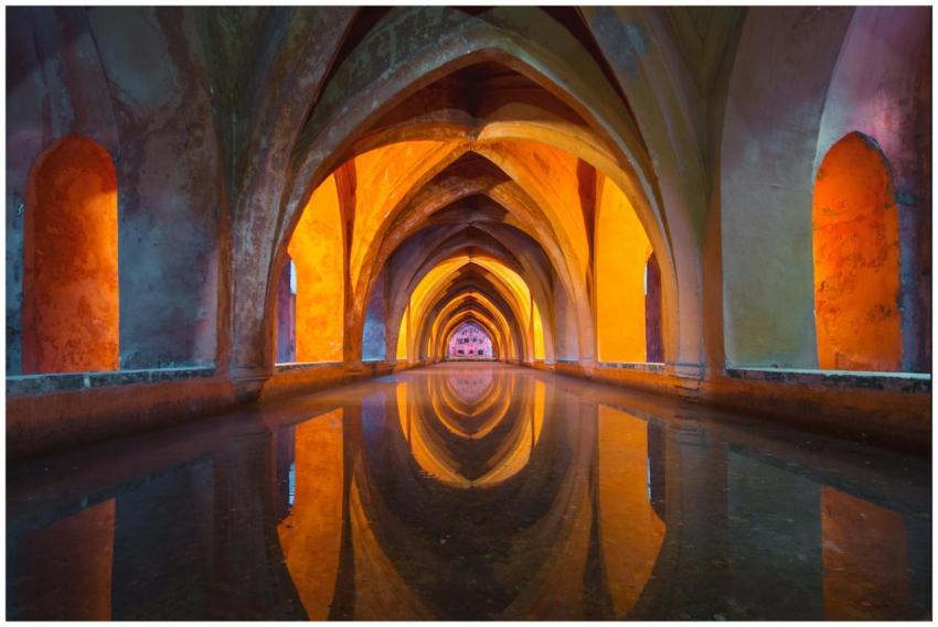 Beautiful Gothic arches reflecting in water, vibra