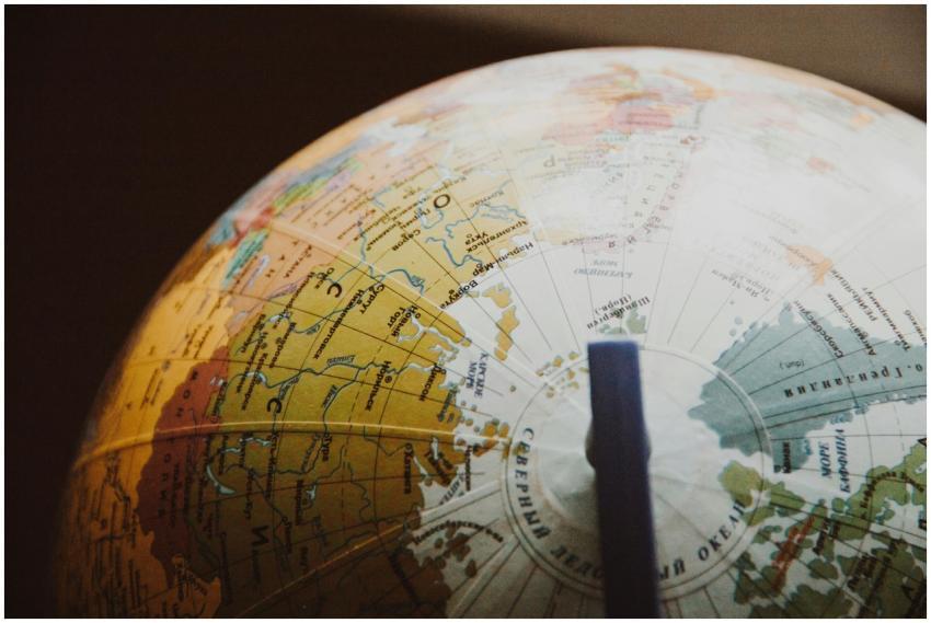 A detailed image of a globe highlighting various c