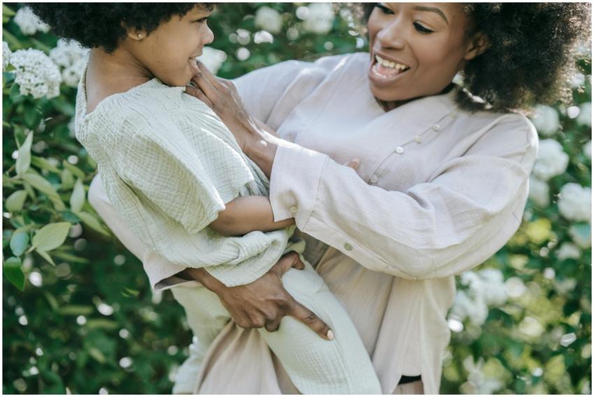 Playful interaction between mother and child in na