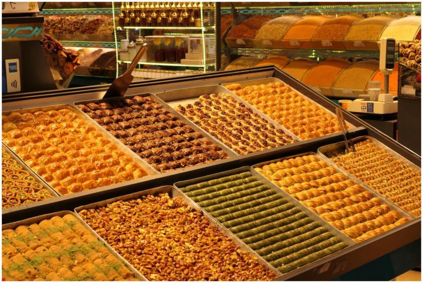 A display of diverse Middle Eastern pastries in a