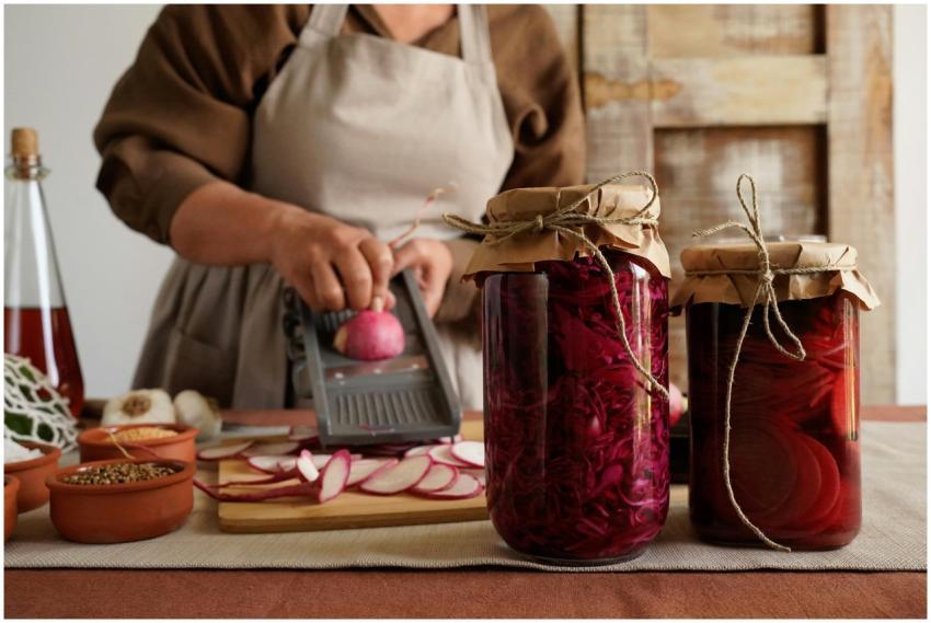 Woman preparing pickled radishes in a rustic kitch