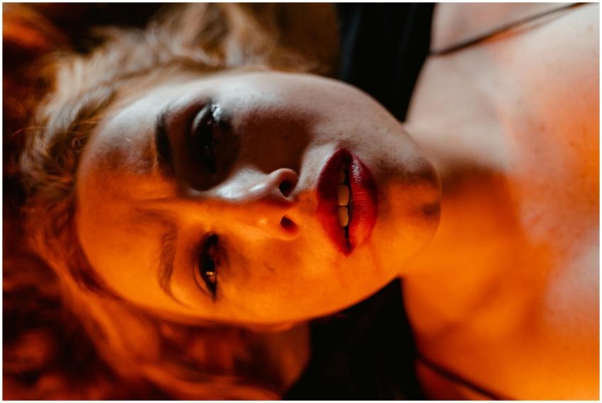 Close-up portrait of a woman with dramatic lightin