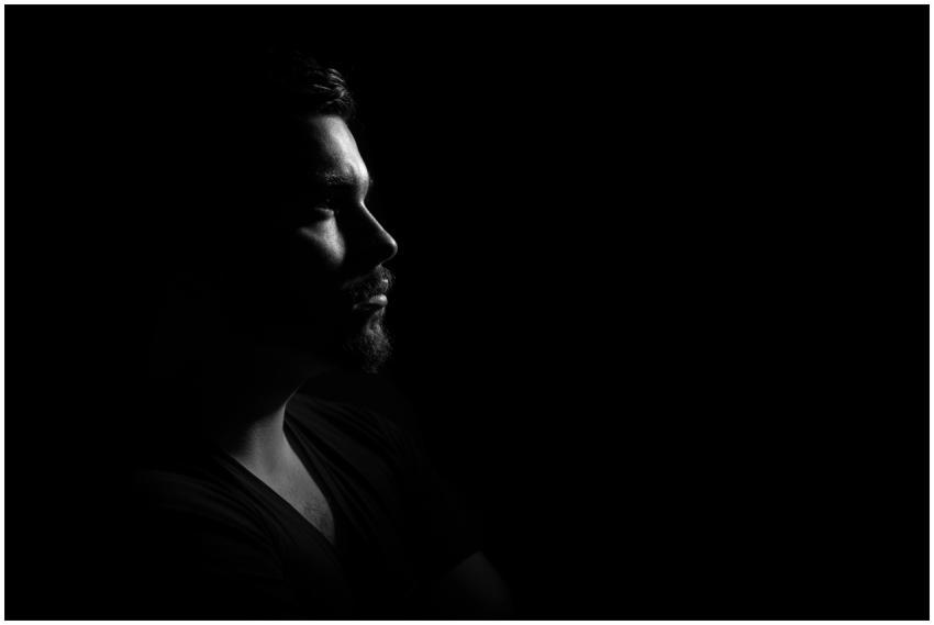 Profile portrait of a man in black and white, emph