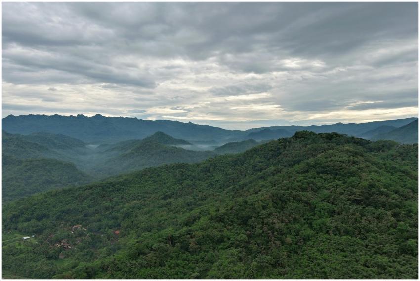 Stunning aerial view of misty mountains in Kecamat