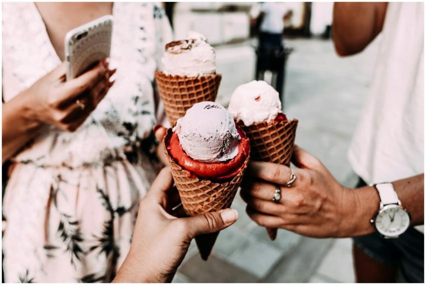 Crop anonymous friends in casual summer clothes cl