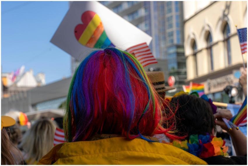 Colorful scene at a Pride parade in Riga, showcasi