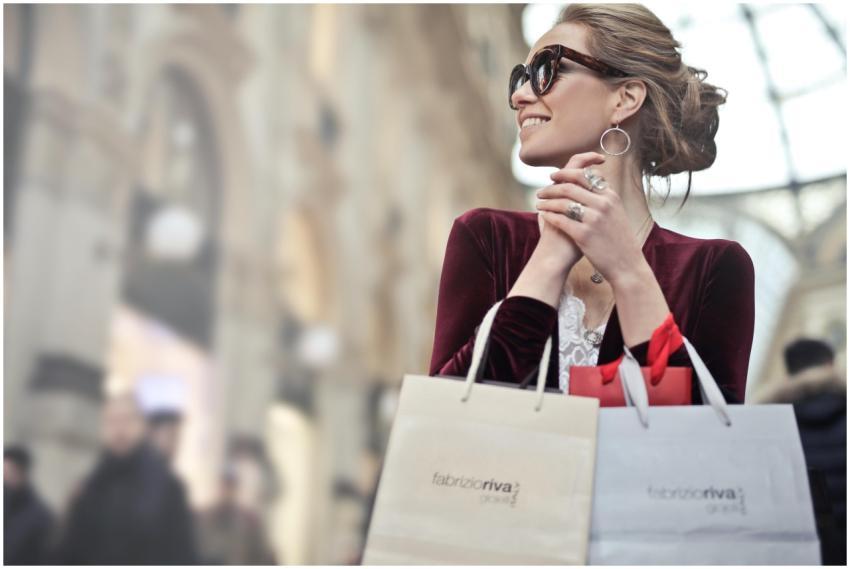 Stylish woman with shopping bags in Galleria Vitto