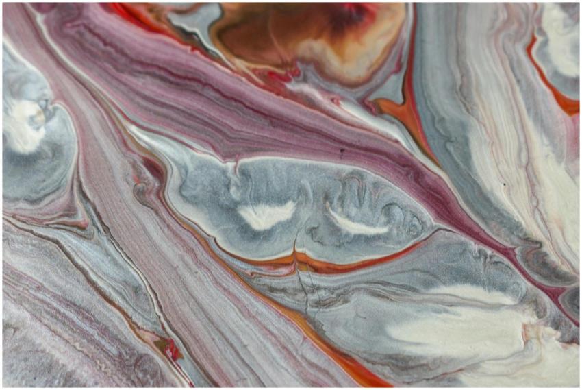 A close-up view of a vibrant fluid acrylic abstrac