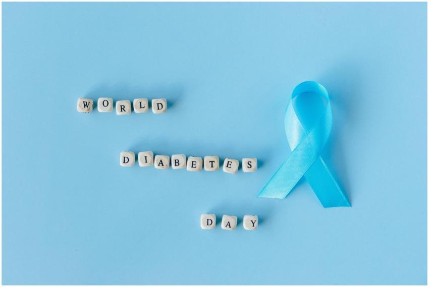 Blue ribbon symbolizing World Diabetes Day on a bl