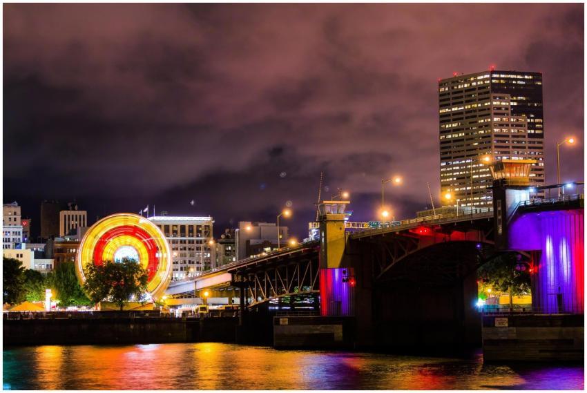 A night view of Portland's illuminated skyline fea